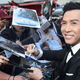 Yen signs autographs at his footprint ceremony at TCL Chinese Theater in Los Angeles.